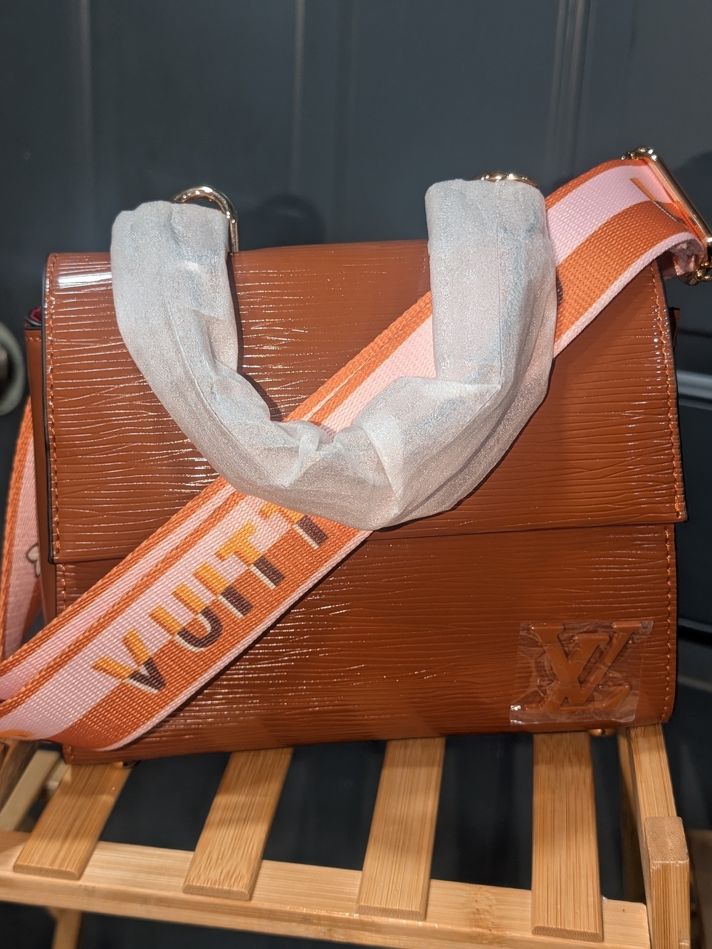 Fashion Inspired Brown Epi Leather Crossbody with Orange and Pink Strap
